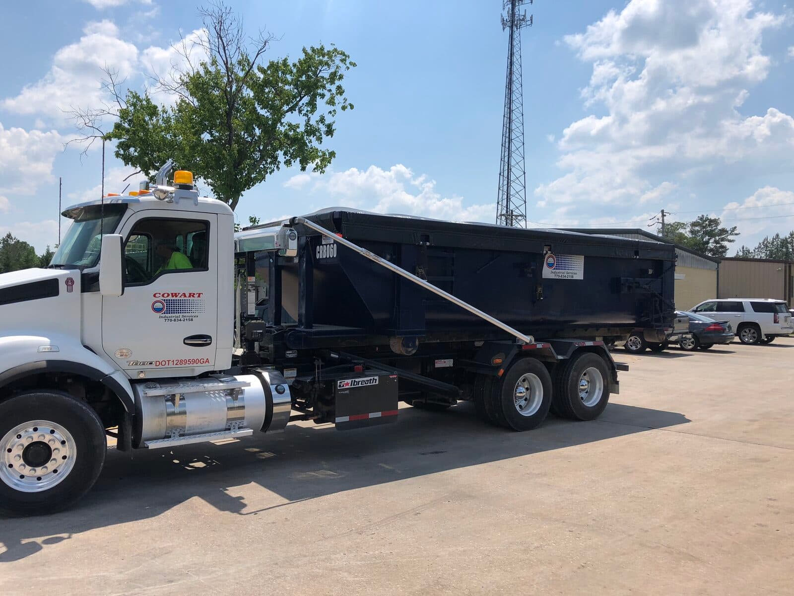 Cowart roll-off truck hauling box CRB-060