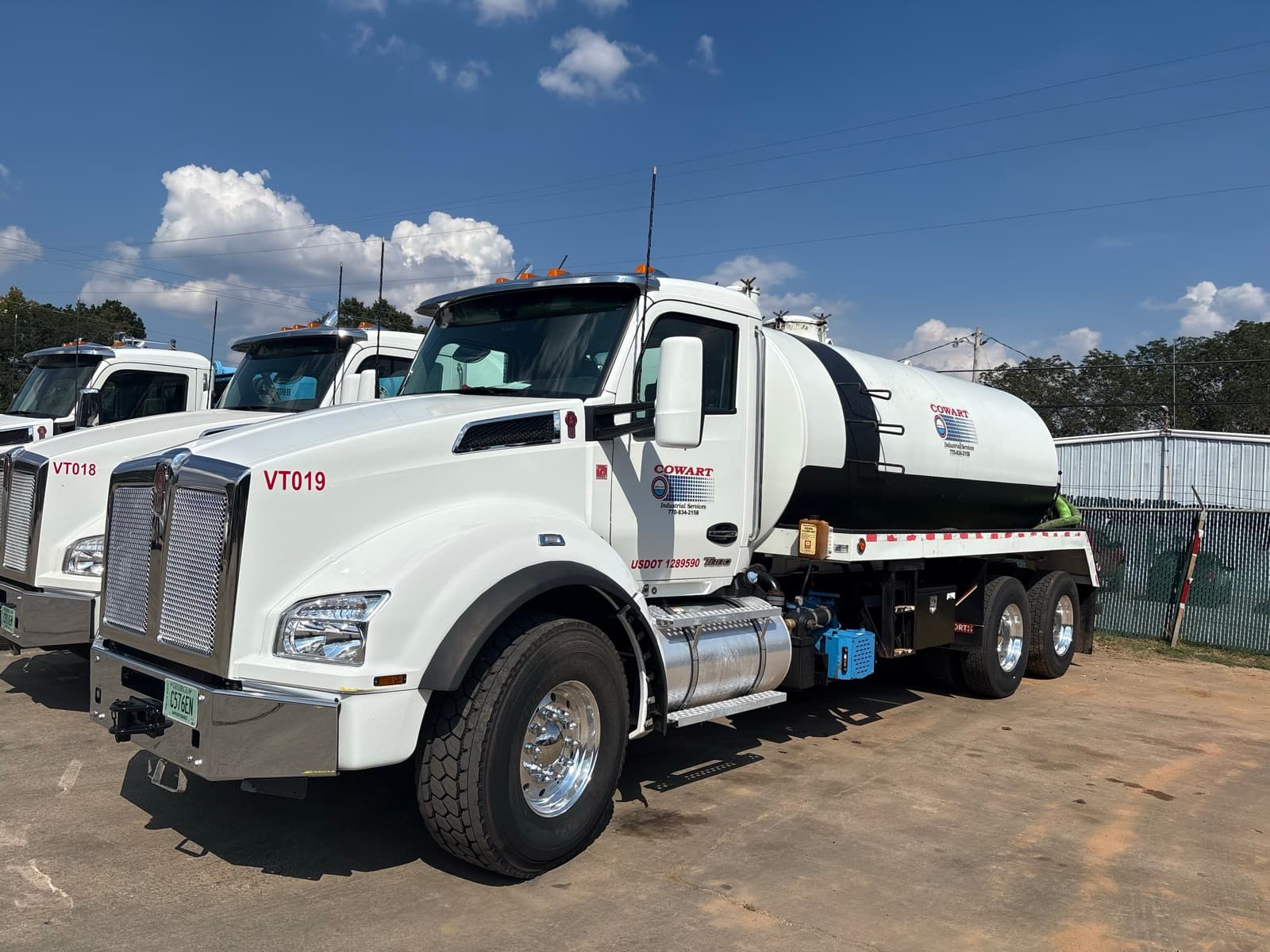 A Cowart Industrial Services vacuum truck in the fleet yard