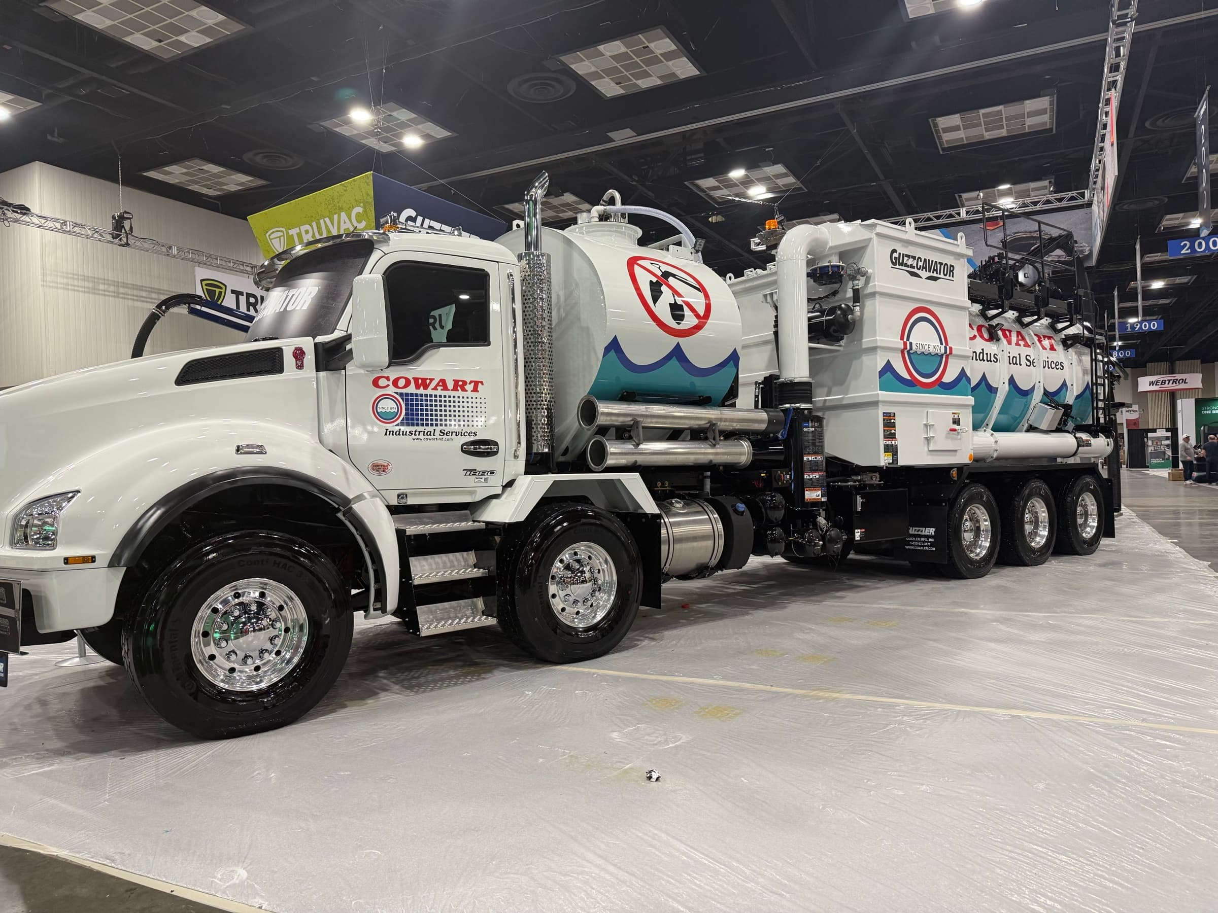 Cowart Guzzacator hydro-excavation rig, Kenworth tractor with truck-mounted vacuum excavator
